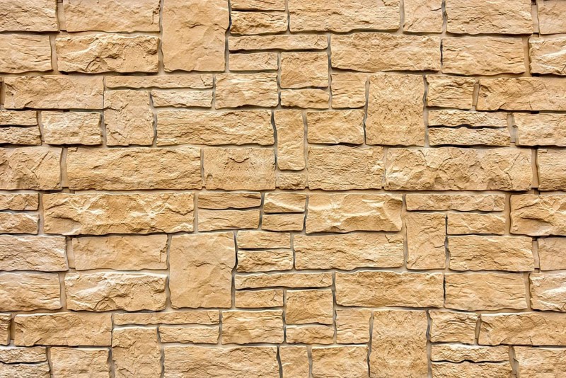 Artificial stone wall, imitation natural stone made of synthetic material, plastic, pattern, structure, background, wallpaper