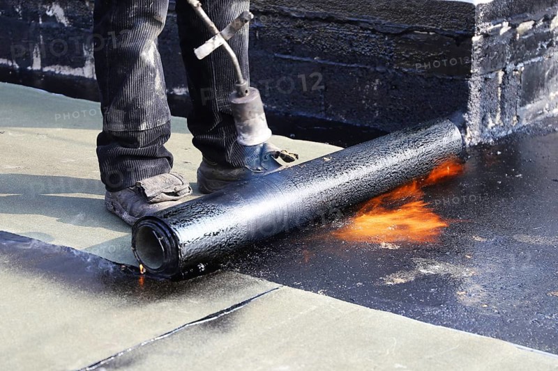 Professional flat roof waterproofing with bitumen welding membranes