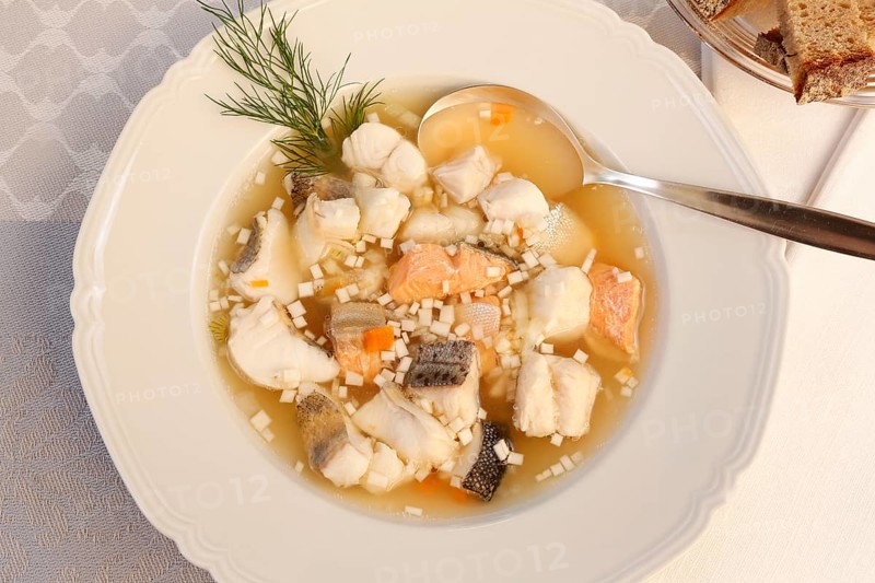 Swabian cuisine, Lake Constance fish pot, fish soup, healthy food, broth, fillet of pike, char, pikeperch, fish leftovers, fish pieces, herbs, dill, soup plate, soup spoon, sliced bread in glass bowl, food, studio, fish dish, cooking, typical Swabian, Germany, Europe