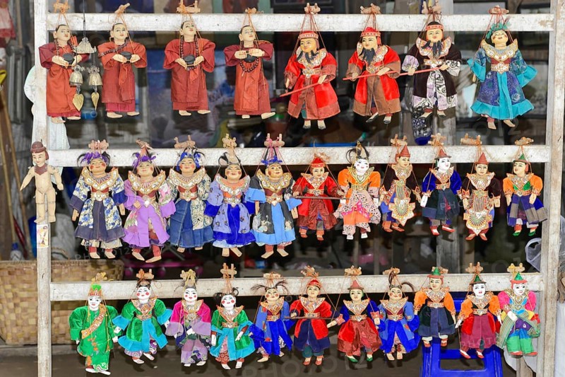 Puppets as souvenirs at Htilominlo Temple, Bagan, Myanmar, Asia