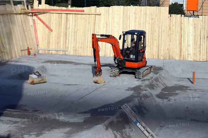Basement excavation, building pit excavation on a large construction site in the new development area of Bad Duerkheim, Rhineland-Palatinate
