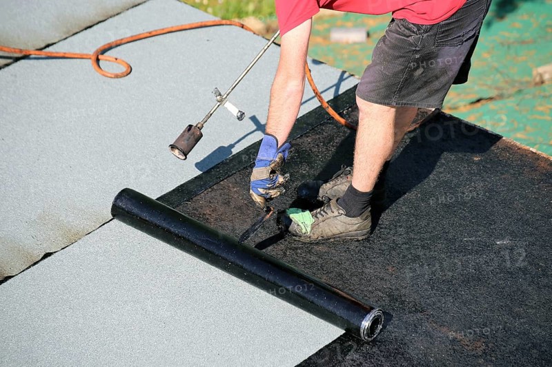 Professional flat roof waterproofing with bitumen welding membranes