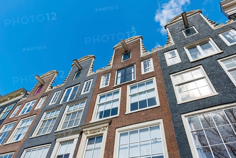 Row of houses with pulleys, architecture, Middle Ages, trade, trading city, warehouse district, facade, city centre, city trip, Amsterdam, Netherlands