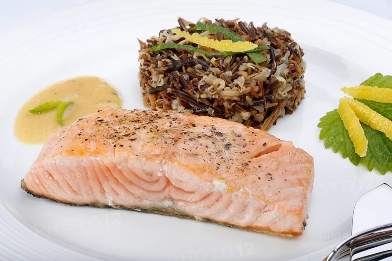 Southern German cuisine, fillet of Dreisam salmon with wild rice and lemon sauce, salmon fillet, healthy eating, decoration, lemon peel, herbs, lemon balm, food plate, fish cutlery, appetising, food, studio, fish dish, cooking, Germany, Europe