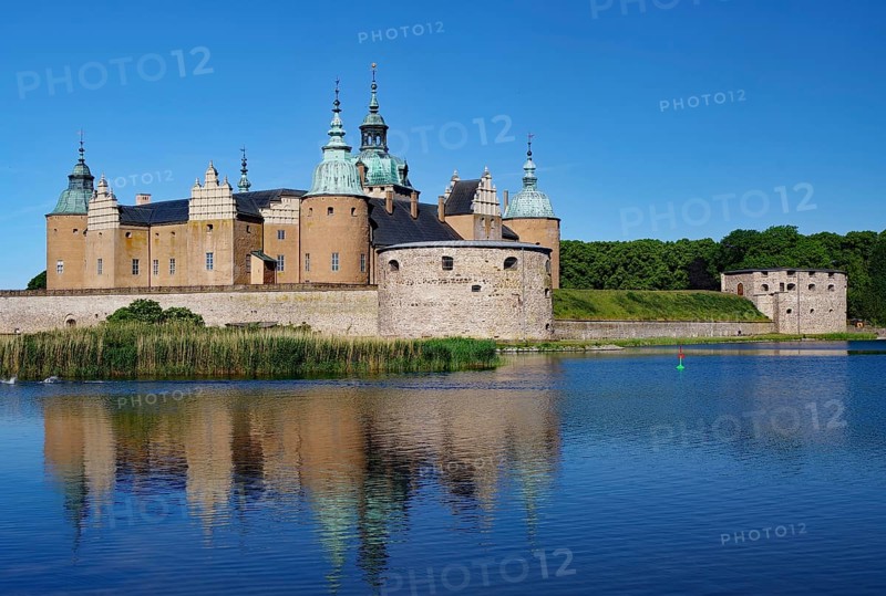 Kalmar Castle with its reflection in the water on a sunny day