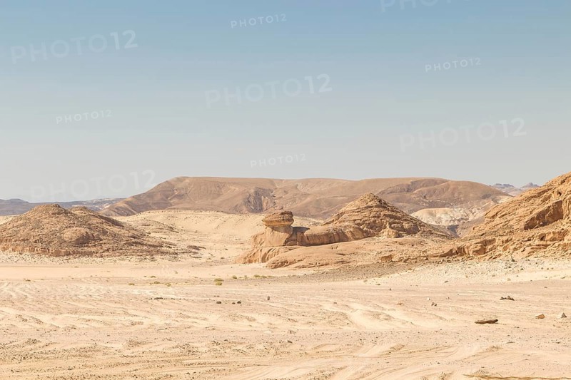 Desert, red mountains, rocks and blue sky. Egypt, the Sinai Peninsula, Dahab