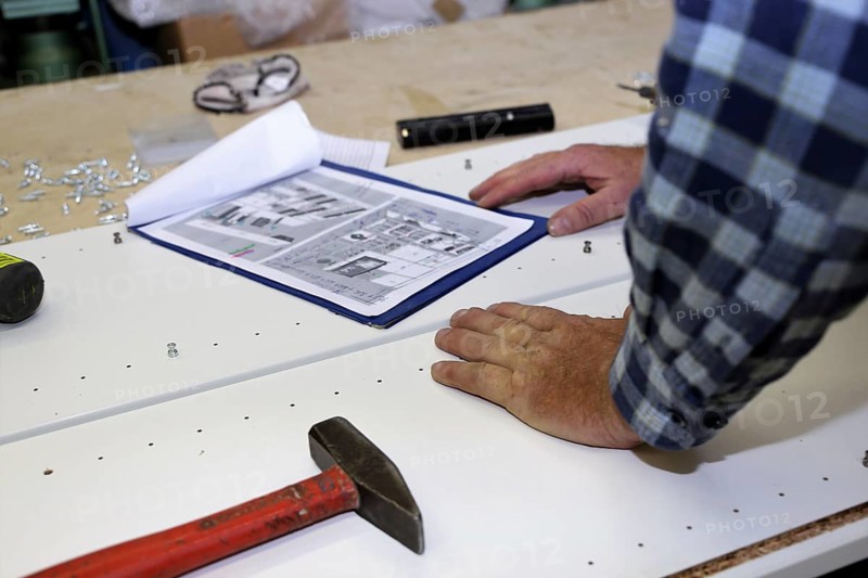 Carpenter at work in his carpentry workshop