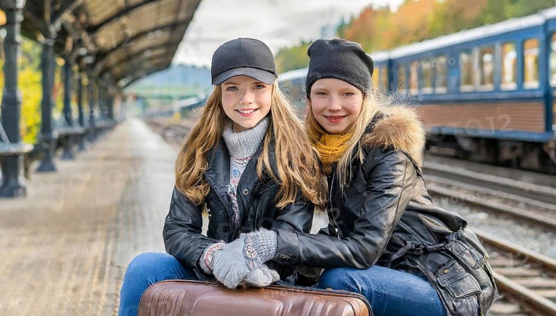 AI generated, Two young blonde woman want to travel and wait in the station for the train, 18, blond, blonde, modern, modern, suitcase, handbag, leather jacket, white, sneakers, shoes, sexy, attractive, attractive, long-haired, transport, traffic