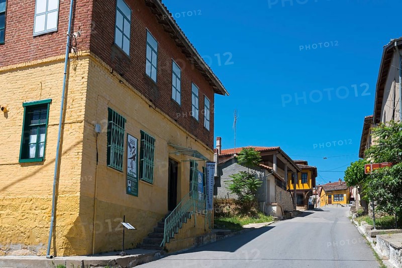 Charming cobbled street with rustic, colourful houses in an old town, Koukoulospito, house with traditional architecture built for rearing silkworms, museum, Soufli, Eastern Macedonia and Thrace, Greece, Europe