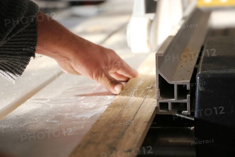 Carpenter at work in his carpentry workshop
