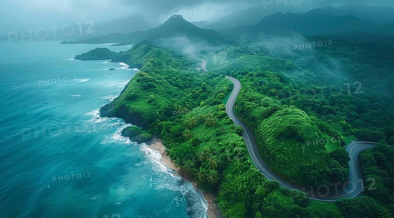 Aerial view of a winding road along a foggy coastline with lush green cliffs and ocean, ai generated, AI generated