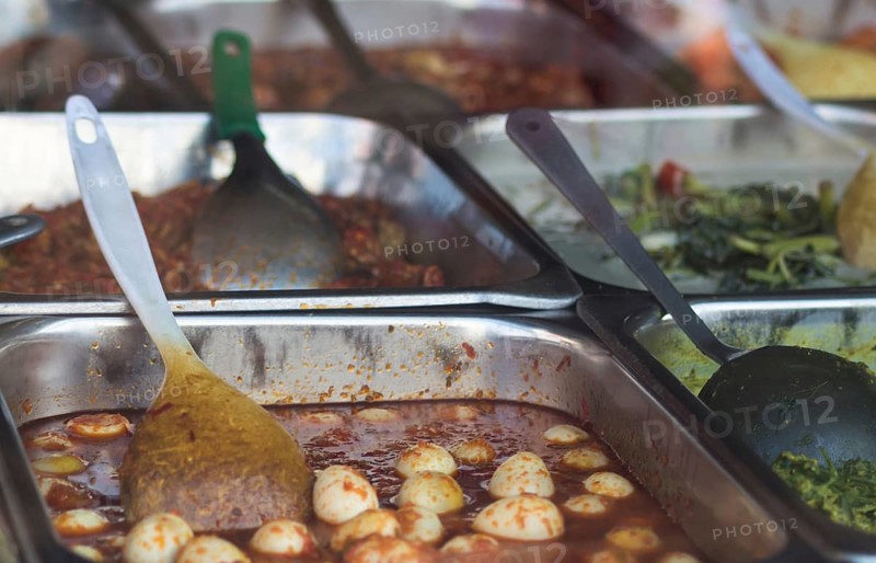 Chinese and Asian food on the market, rice, chips, noodles, sweets