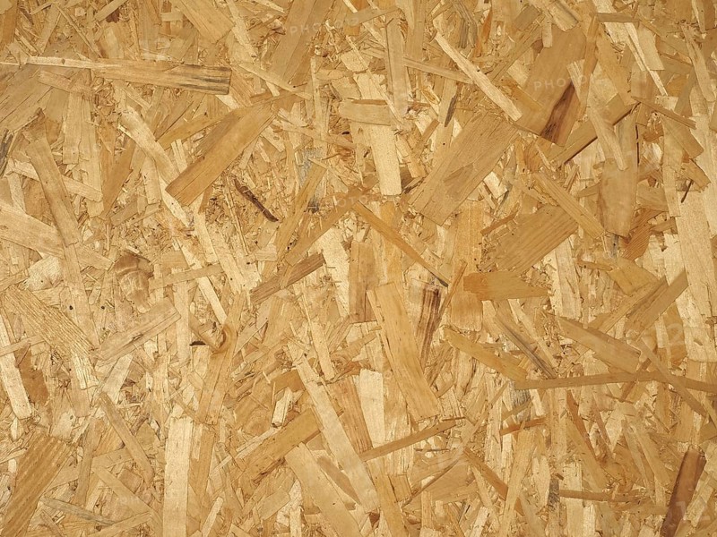 Yellow brown oriented strand board wood texture background