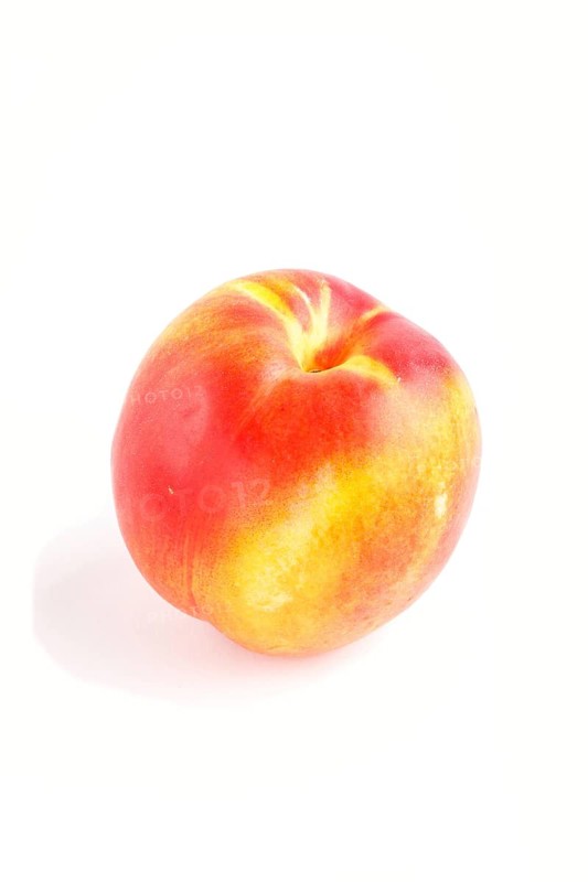 Nectarine isolated on white background. Side view, close up