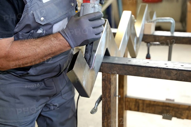 Labourer in the locksmith's shop