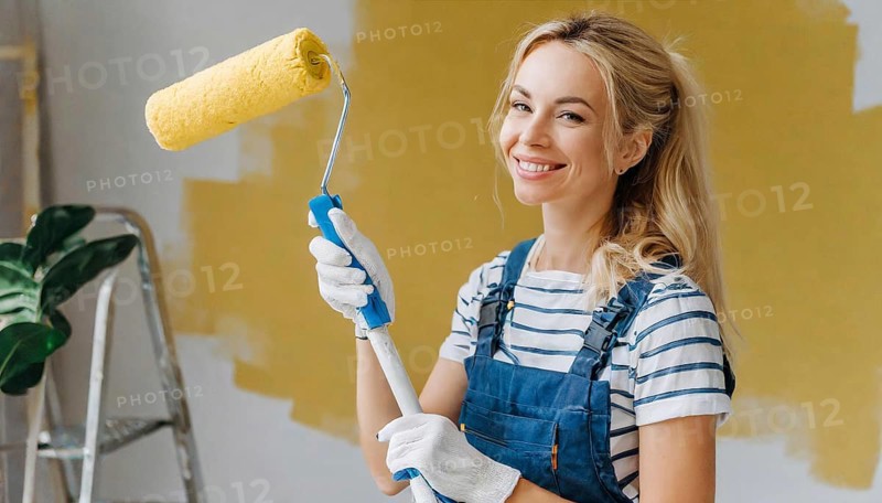 AI generated, woman, woman, a young girl paints a wall with new paint, yellow, yellow, renovation of old flat, paint roller, ladder, paint, 20, 25, years, one, one person, daughter, student, pastime, family, girl, smiling, smiling, fun at work, laughing, laughing, laughing, dungarees, jeans