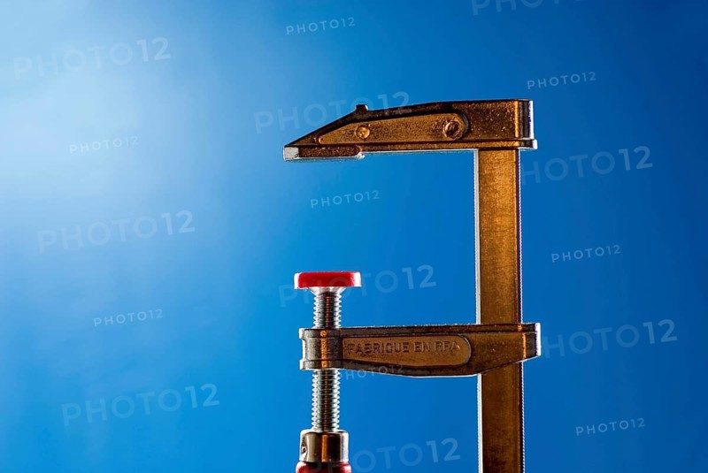 Open clamp in a workshop of a joiner
