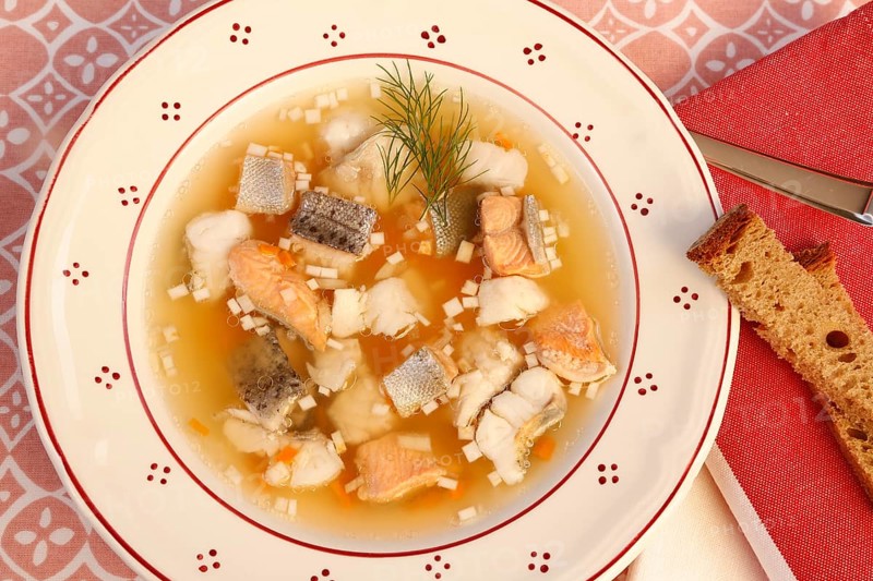 Swabian cuisine, Lake Constance fish pot, fish soup, healthy eating, broth, fillet of pike, char, pikeperch, fish leftovers, pieces of fish, herbs, dill, soup plate, soup spoon, sliced bread, food, studio, fish dish, cooking, typical Swabian, Germany, Europe