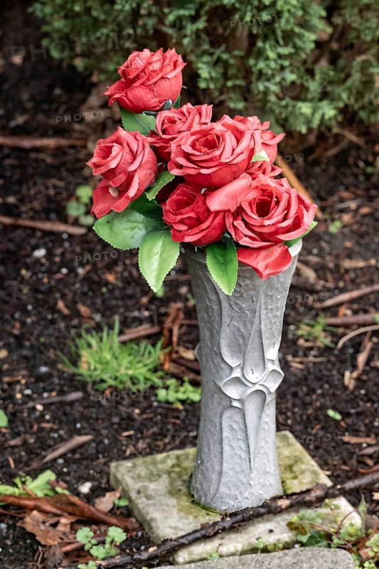 Artificial roses in a flower vase