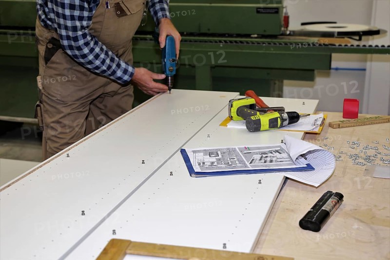 Carpenter at work in his carpentry workshop