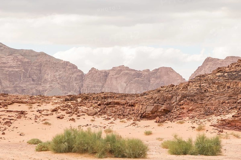 Desert, red mountains, rocks and cloudy sky. Egypt, color canyon, the Sinai Peninsula, Dahab
