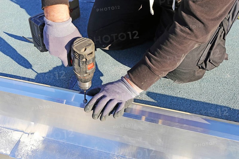Tinsmith work on a flat roof