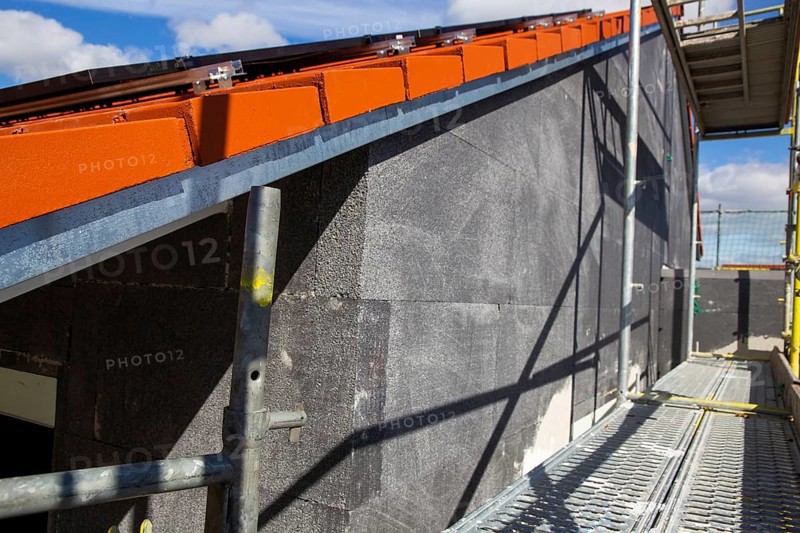 Thermal insulation of a house facade