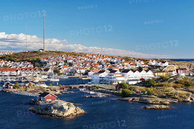 View over rocks and a small town with white houses, Vaestra Goetalands Laen, Sweden, Europe