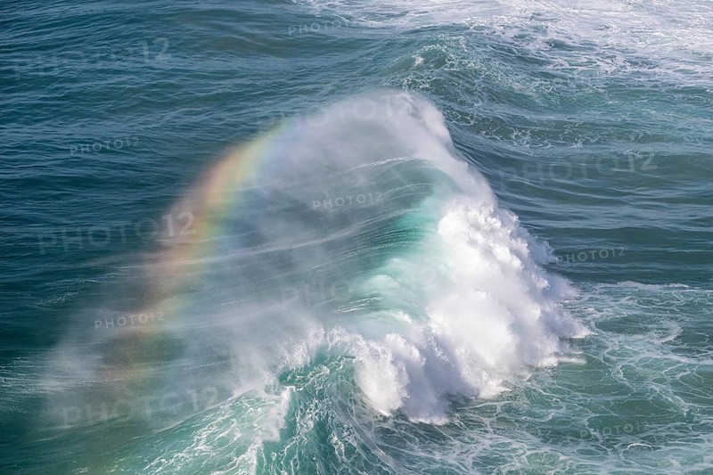 Spectral colours in the spray of a crashing wave, Nazare, Portugal, Europe