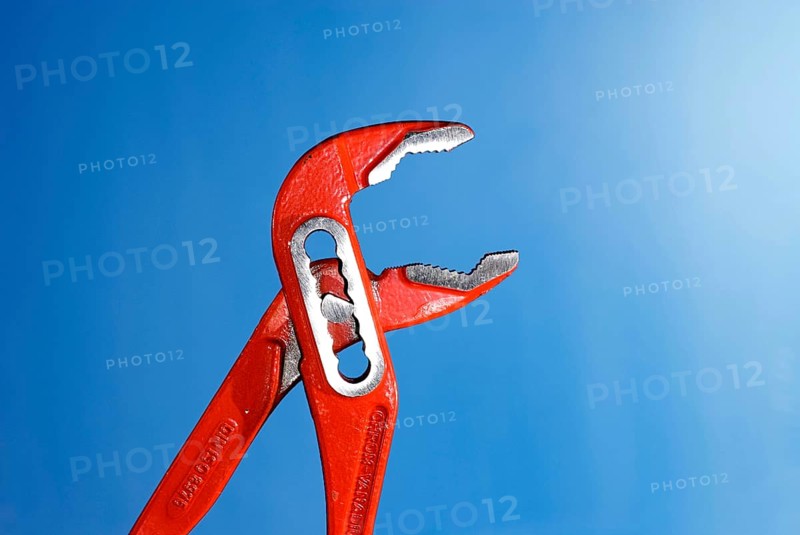 Open, opened red Tongue-and-groove pliers