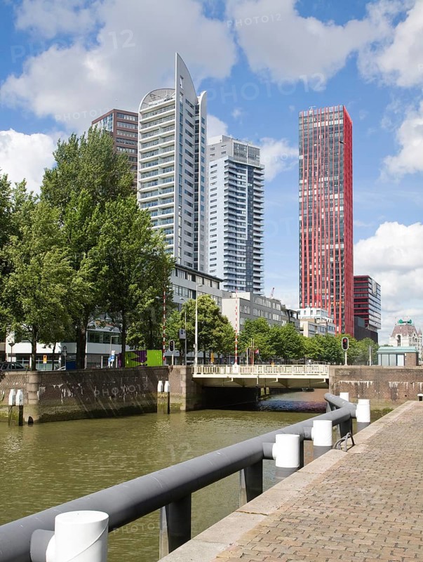 High rise office blocks and Red Apple residential apartments from Scheepmakers Haven, Rotterdam, Netherlands