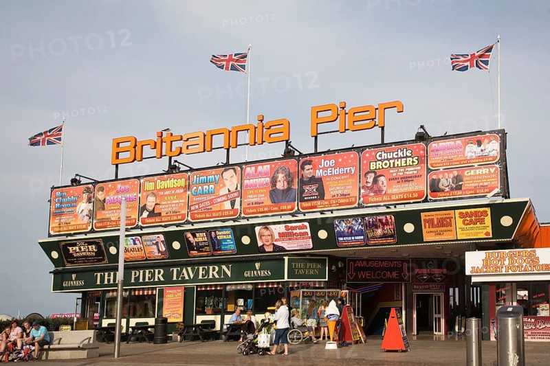 Britannia Pier entrance with adverts for theatre shows, Great Yarmouth, Norfolk, England, United Kingdom, Europe