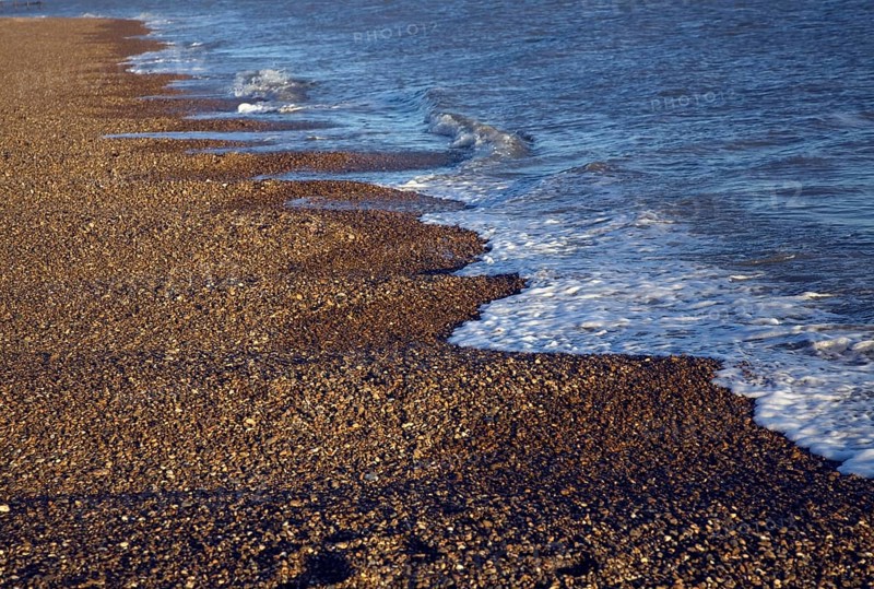 Waves forming cusps on shingle beach, Bawdsey, Suffolk, England, United Kingdom, Europe