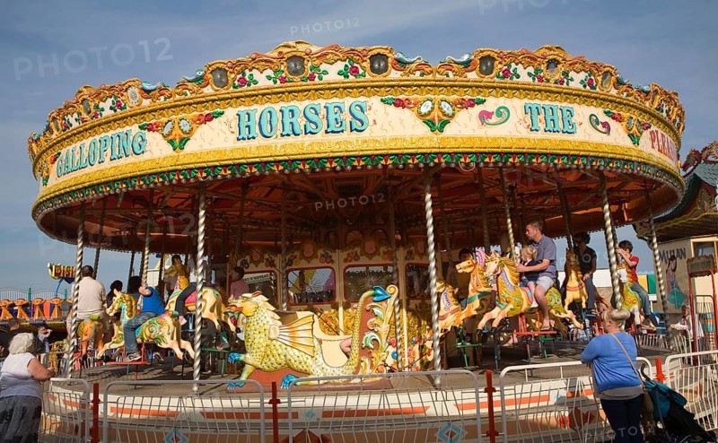 Galloping Horse traditional fairground carousel ride, Great Yarmouth, Norfolk, England, United Kingdom, Europe