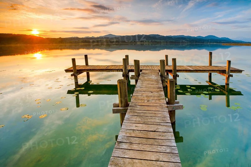 Wooden footbridge on Lake Pfaeffikon at sunrise, Pfaeffikon, Canton Zurich, Switzerland, Europe