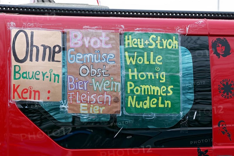 Poster with a list of agricultural products on a vehicle, farmers' protests, demonstration against the policy of the traffic light government, abolition of agricultural diesel subsidies, Duesseldorf, North Rhine-Westphalia, Germany, Europe