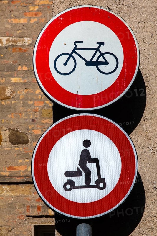 Old town signs against bicycles and e-scooters, Grado Island, north coast of the Adriatic, Friuli, Italy, Grado, Friuli, Italy, Europe