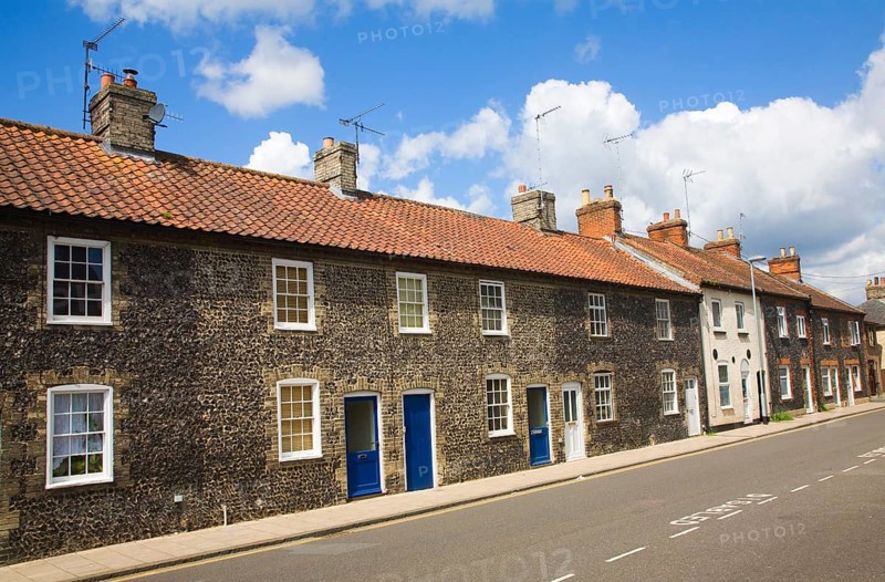 Small row of terraced houses faced with flint, Thetford, Norfolk, England, United Kingdom, Europe