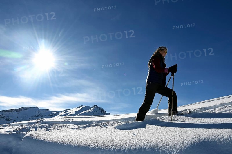 Snowshoe hiking in the Beverin nature park Park, Graubuenden, Switzerland, Europe