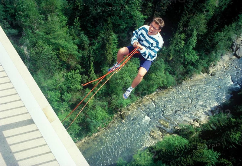 Man jumping from Bridge Echelsbacher Brucke, river Ammer, Murnau, Upper Bavaria, Germany, vintage, retro, Europe