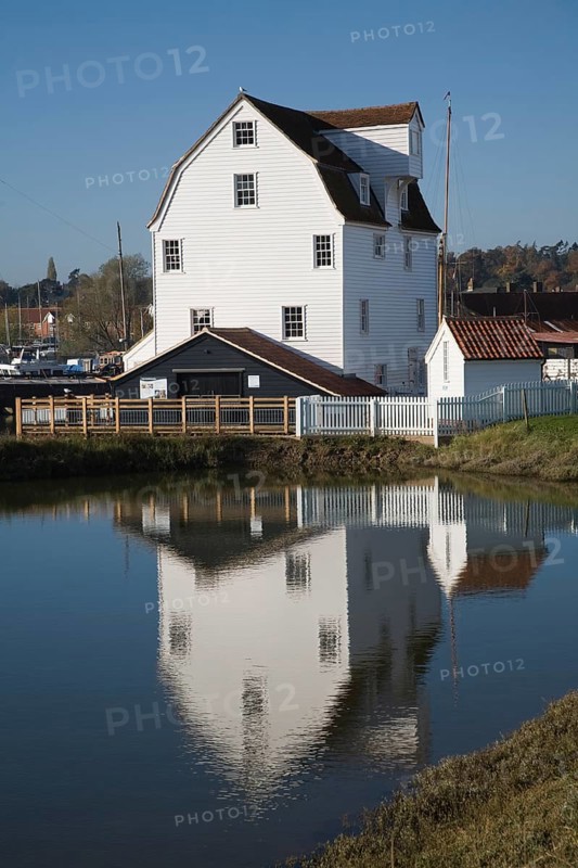 Tide mill pool reflection in mill pond Eiver Deben, Woodbridge, Suffolk, England. The present mill was built in 1793 on the site of more ancient mills and has been restored as a working mill and living museum
