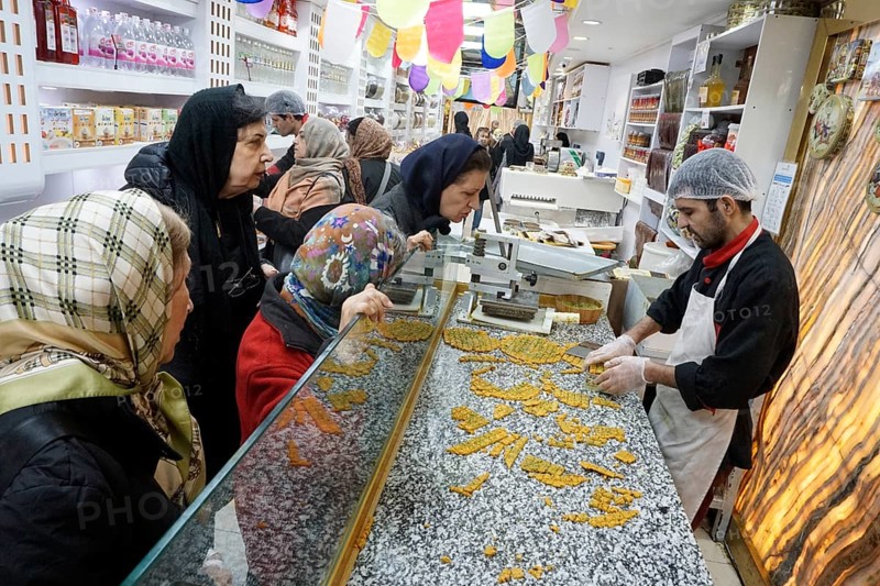 Sweet pastries, nuts and spices in a bazaar in Tehran, Iran, 09/03/2019, Asia