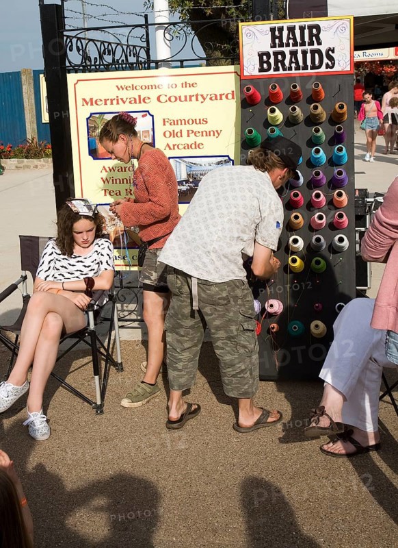 Street hair braiding, Great Yarmouth, Norfolk, England, United Kingdom, Europe