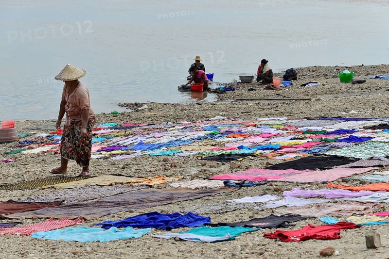 Washing clothes in the Irrawaddy, Myanmar, Asia