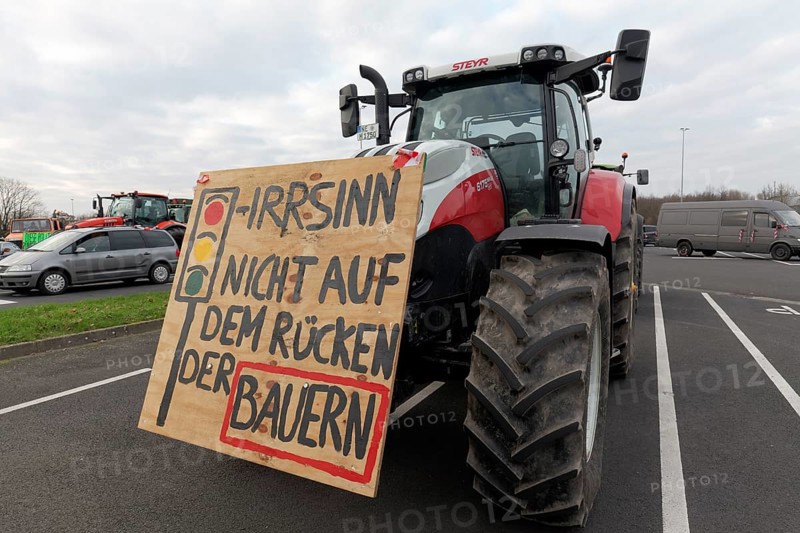 Not on the backs of farmers, placard on a tractor, farmers' protests, demonstration against policies of the traffic light government, abolition of agricultural diesel subsidies, Duesseldorf, North Rhine-Westphalia, Germany, Europe