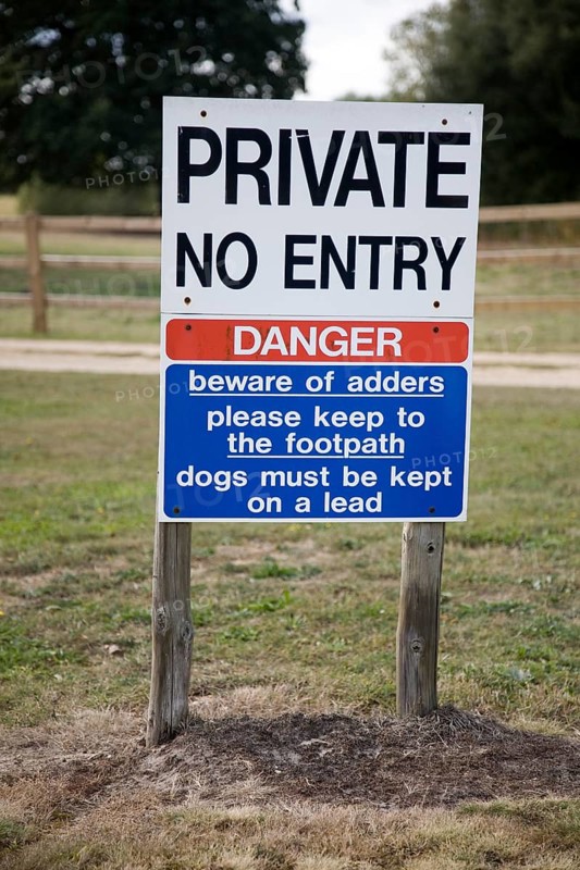 Private No entry sign warning of adder snakes, Wantisden, Suffolk, England, United Kingdom, Europe
