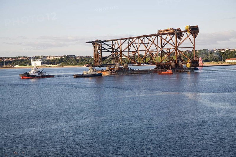 Large North Sea oil drilling platform leaving the River Tyne, Tynemouth, Northumberland, England, United Kingdom, Europe