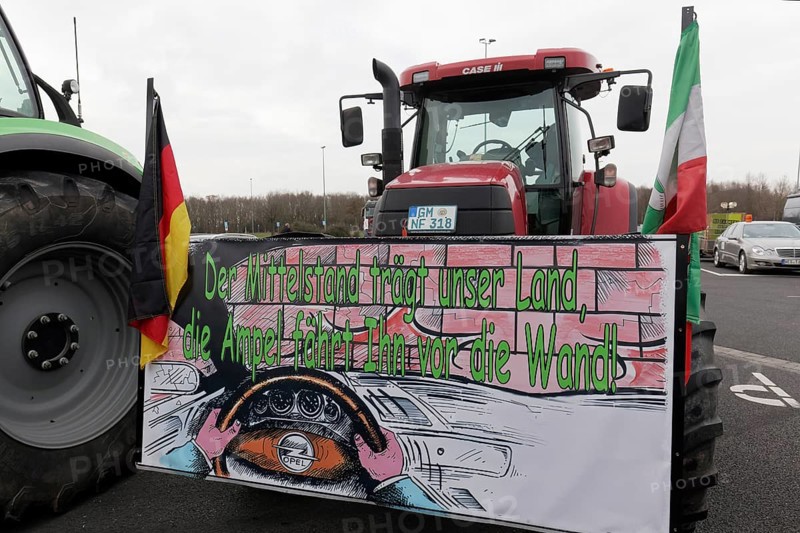 Sign with the theme Mittelstand on a tractor, farmers' protests, demonstration against the policy of the traffic light government, abolition of agricultural diesel subsidies, Duesseldorf, North Rhine-Westphalia, Germany, Europe