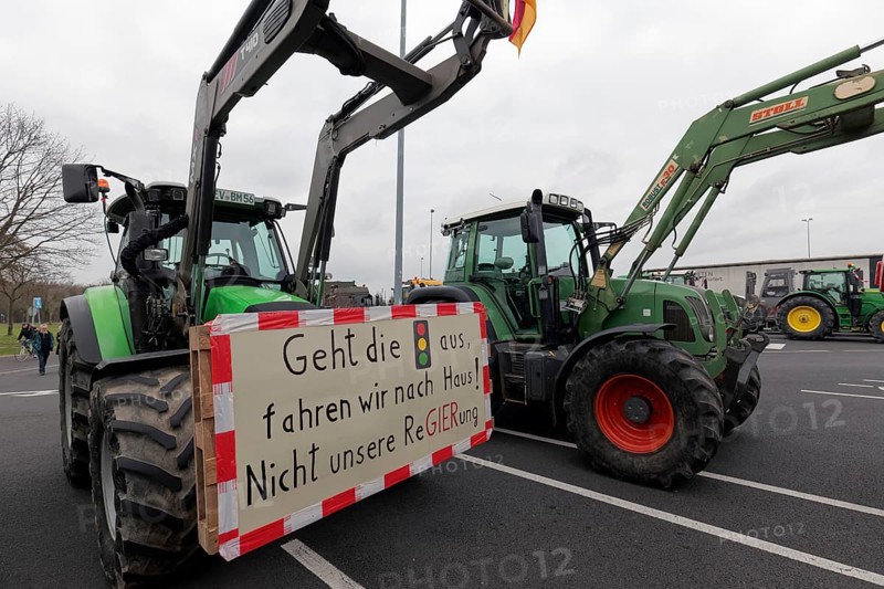 Tractor with sign, Not our government, Farmer protests, Demonstration against policies of the traffic light government, Abolition of agricultural diesel subsidies, Duesseldorf, North Rhine-Westphalia, Germany, Europe
