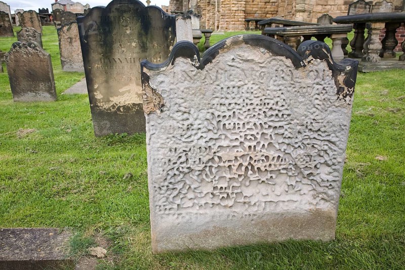 Heavily weathered gravestone at Tynemouth priory, Northumberland, England, United Kingdom, Europe
